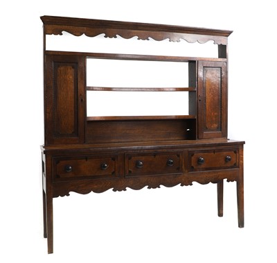 Lot 482 - A George III oak 'Anglesea' dresser