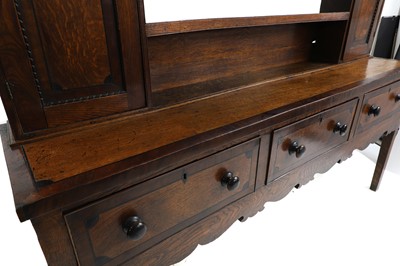 Lot 482 - A George III oak 'Anglesea' dresser