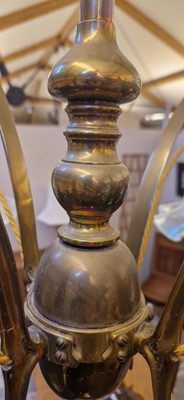 Lot 8 - A pair of Arts and Crafts brass four-branch ceiling lights