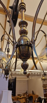 Lot 8 - A pair of Arts and Crafts brass four-branch ceiling lights