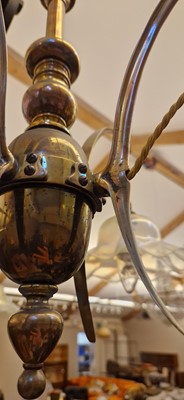 Lot 8 - A pair of Arts and Crafts brass four-branch ceiling lights