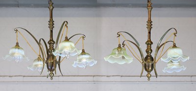 Lot 8 - A pair of Arts and Crafts brass four-branch ceiling lights