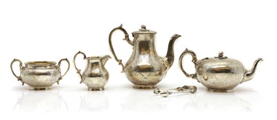 Lot 2 - A composed silver-gilt four piece service