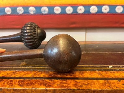 Lot 377 - Two Oceanic wooden throwing clubs