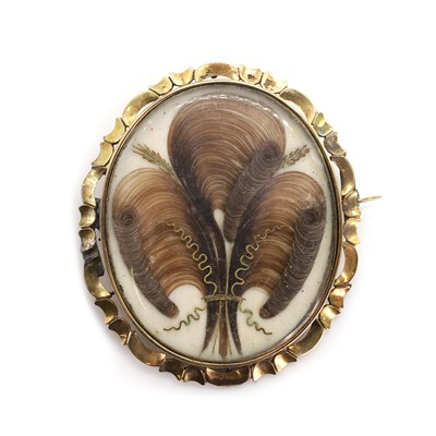 Lot 7 - A Victorian gold mourning brooch