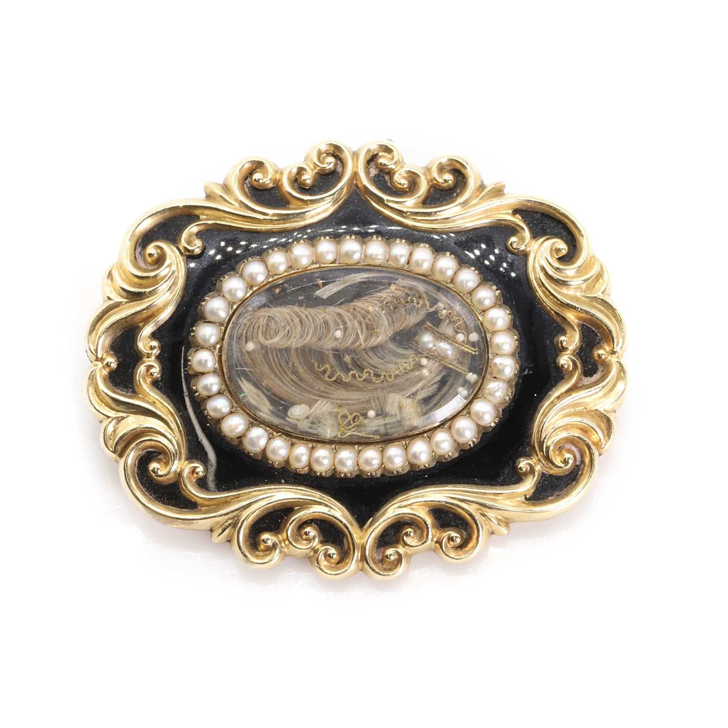 Lot 3 - A late Georgian enamel and split pearl mourning brooch