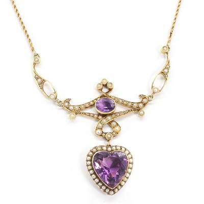 Lot 44 - An Edwardian gold amethyst and split pearl necklace