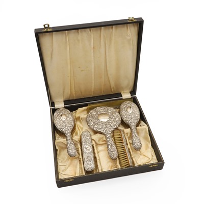 Lot 23 - A silver mounted associated dressing table set