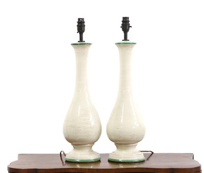 Lot 654 - A pair of modern terracotta vase lamps