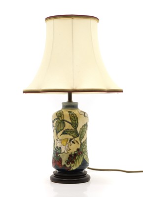 Lot 145 - A Moorcroft 'Strawberry' pottery table lamp