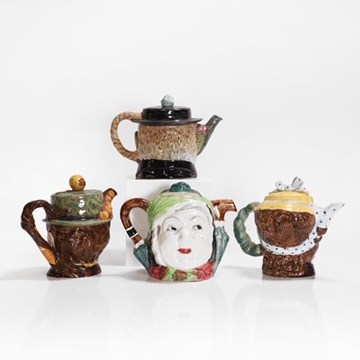 Lot 178 - Four pottery teapots and covers