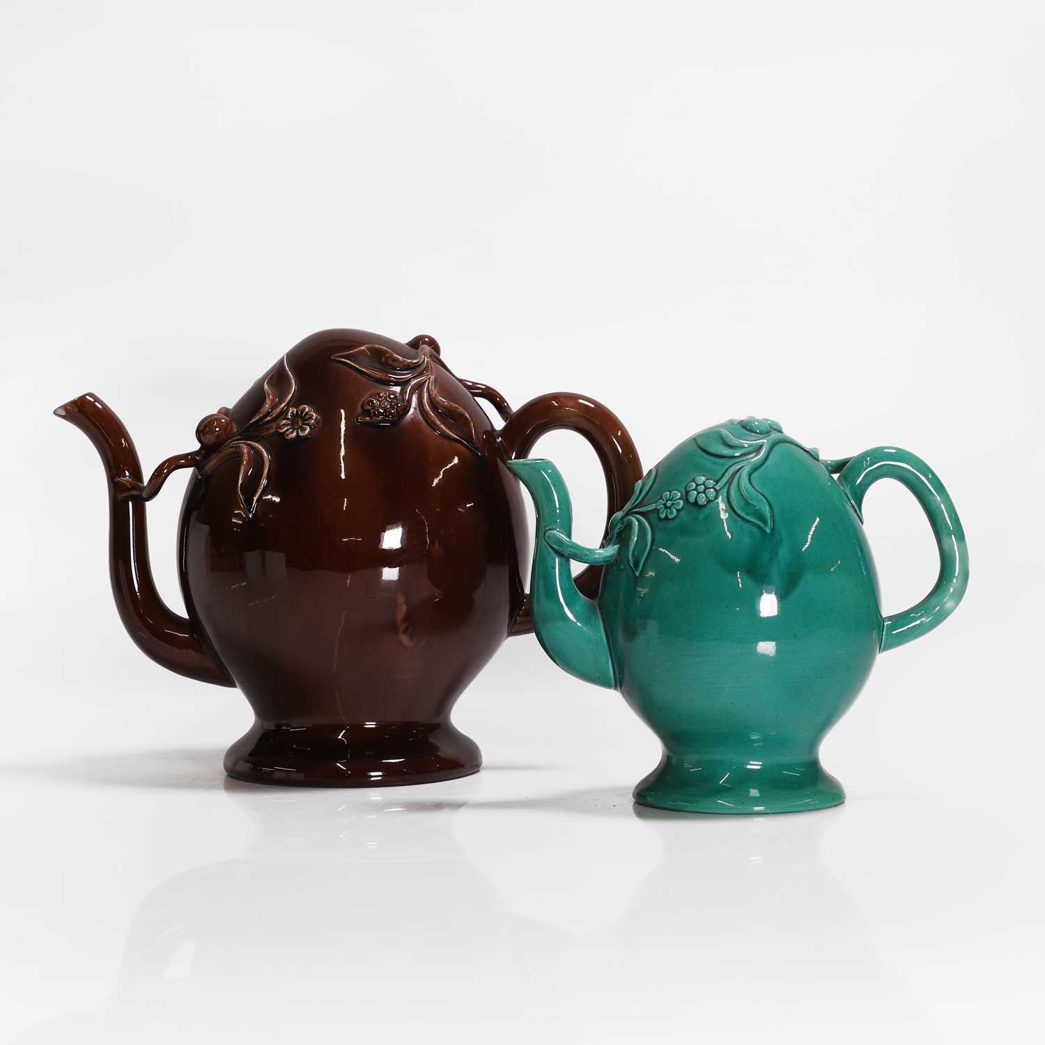 Lot 202 - Two Cadogan teapots