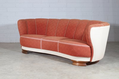 Lot 245 - An orange and cream moquette banana sofa