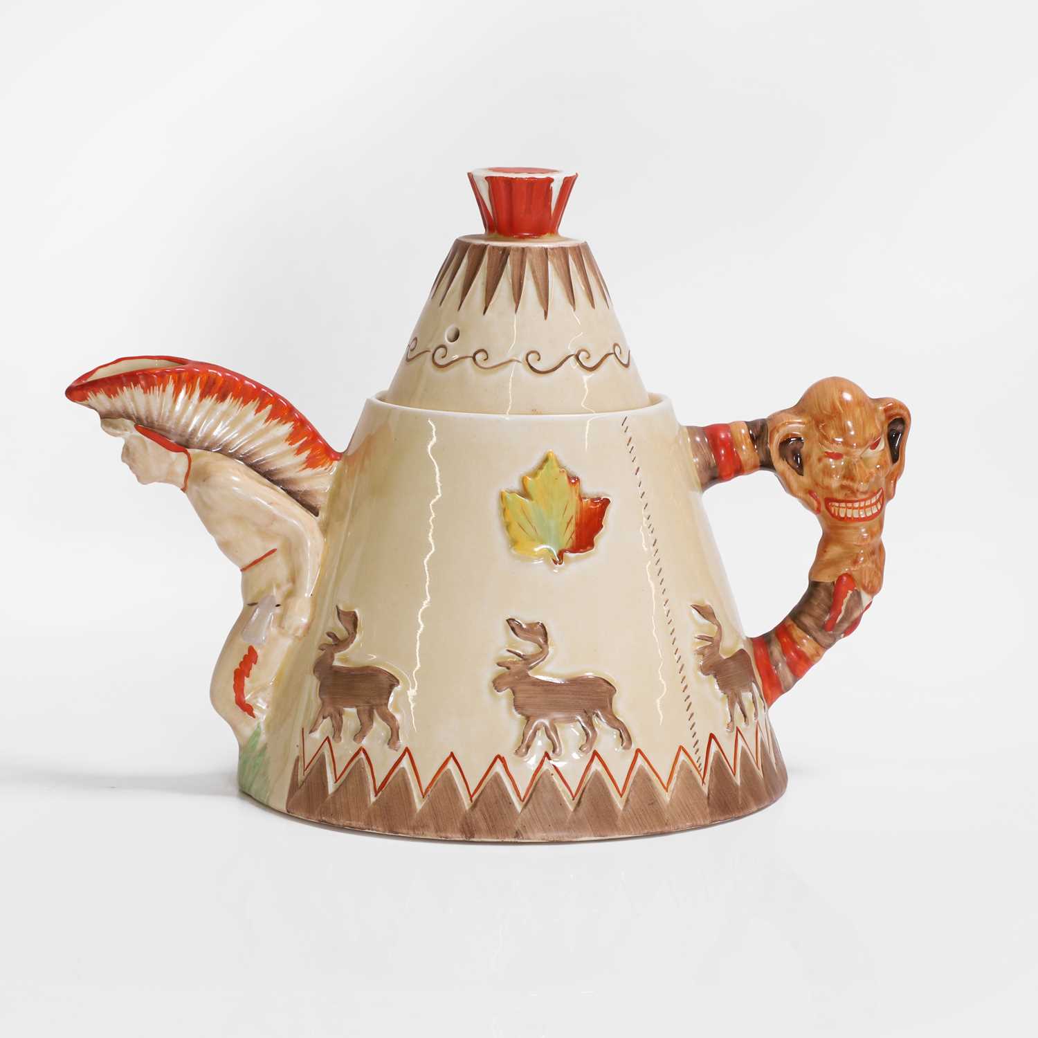 Lot 199 - A pottery teepee teapot and cover