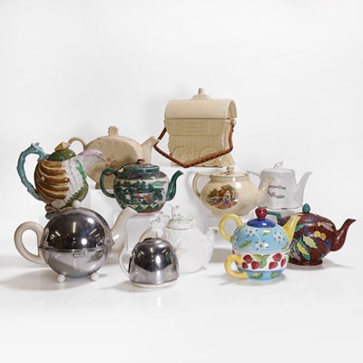 Lot 204 - Ten pottery teapots and covers