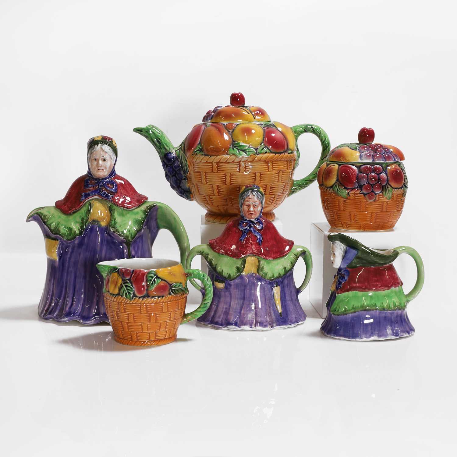 Lot 205 - A three-piece pottery tea set