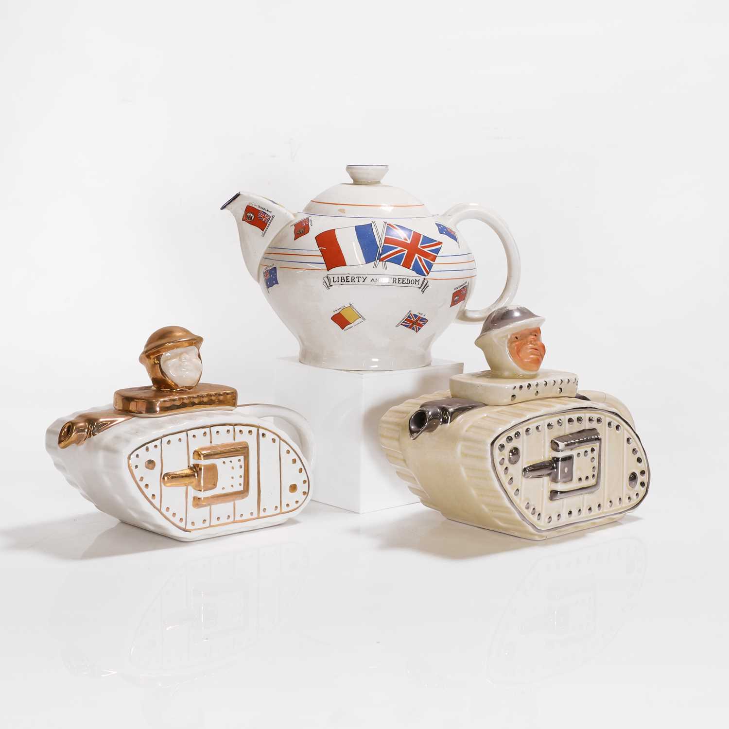 Lot 165 - A teapot modelled as a tank