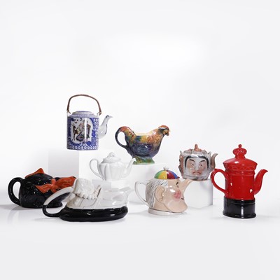 Lot 207 - Eight pottery teapots and covers