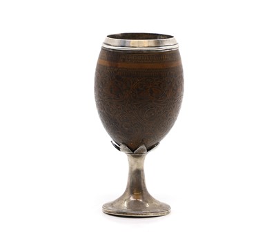 Lot 72 - A George III silver mounted coconut goblet