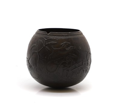 Lot 334 - A carved coconut cup