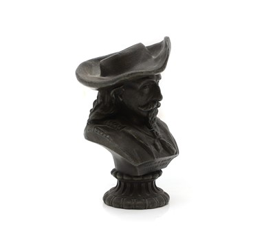 Lot 318 - A spelter match striker