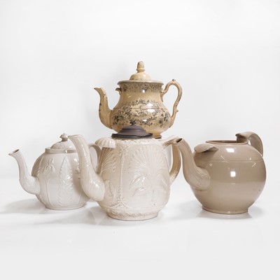 Lot 208 - Four large pottery teapots