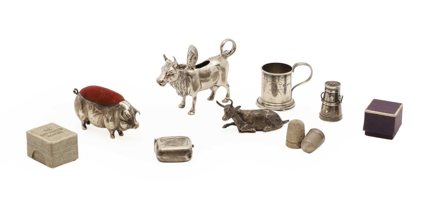 Lot 24 - A silver pig form pin cushion