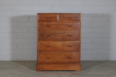 Lot 22 - An Arts and Crafts-style hardwood chest of drawers