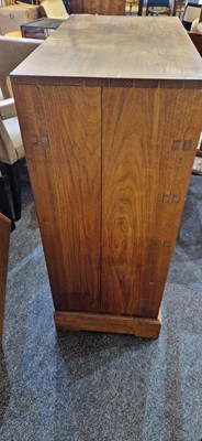 Lot 22 - An Arts and Crafts-style hardwood chest of drawers