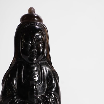 Lot 124 - A Chinese smoky quartz carving