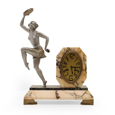 Lot 217 - An Art Deco French marble and spelter clock