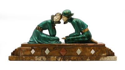 Lot 239 - An Art Deco patinated spelter and ivorine figural group