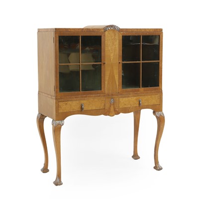 Lot 352 - A French Art Deco burr walnut and satinwood cabinet on stand