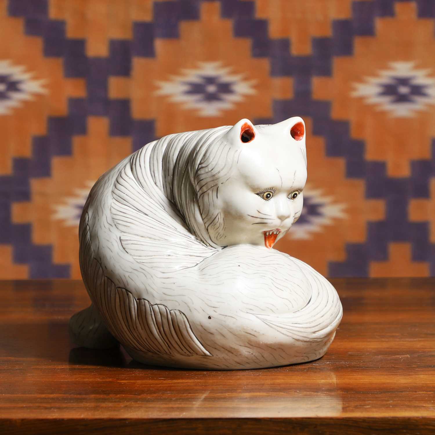 Lot 697 - A Chinese porcelain figure