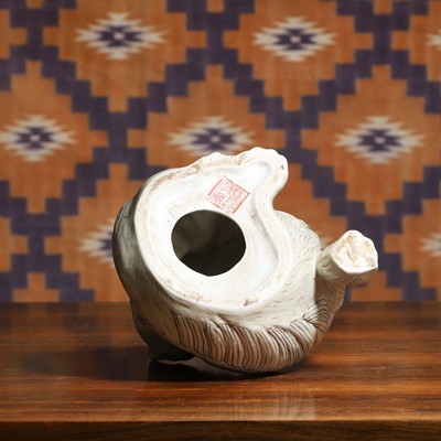 Lot 697 - A Chinese porcelain figure