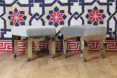 Lot A pair of polished metal stools