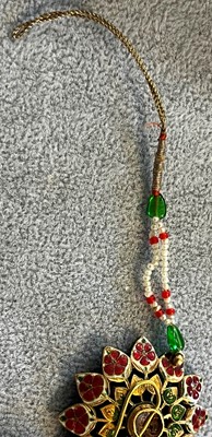 Lot 308 - A pair of Indian gemstone, glass and freshwater pearl earrings and a pendant