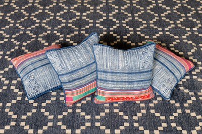 Lot 163 - A group of four indigo-dyed cushions