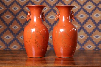 Lot A pair of twin-handled porcelain vases