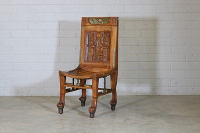 Lot 68 - An 'Egyptomania' brass-mounted stained beech chair