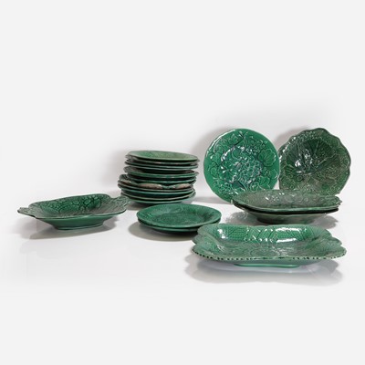 Lot 158 - Twenty green-glazed majolica plates