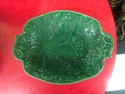 Lot 158 - Twenty green-glazed majolica plates