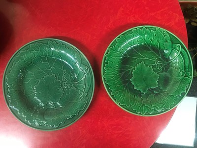 Lot 158 - Twenty green-glazed majolica plates