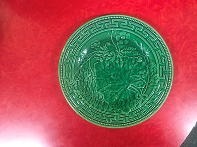 Lot 158 - Twenty green-glazed majolica plates