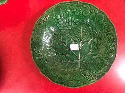Lot 158 - Twenty green-glazed majolica plates