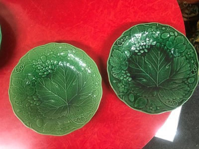 Lot 158 - Twenty green-glazed majolica plates