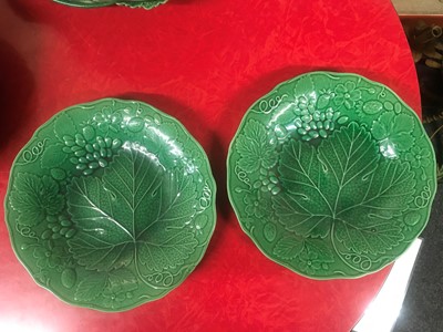 Lot 158 - Twenty green-glazed majolica plates