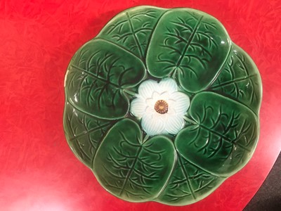 Lot 158 - Twenty green-glazed majolica plates