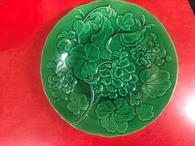 Lot 158 - Twenty green-glazed majolica plates