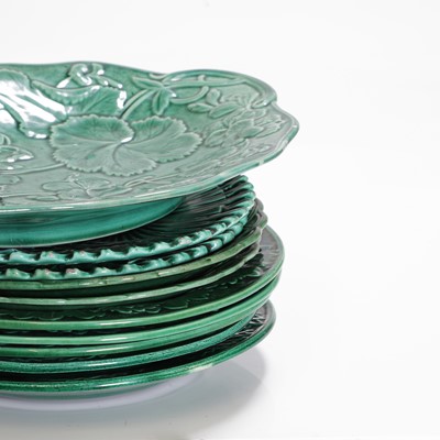 Lot 158 - Twenty green-glazed majolica plates